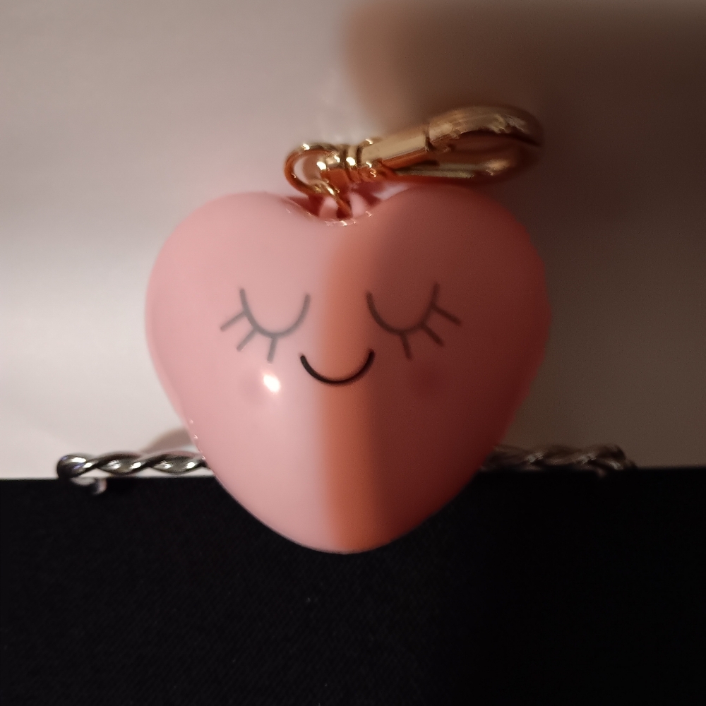 EUC BBW pocketbac holder (hand sanitizer NOT included).